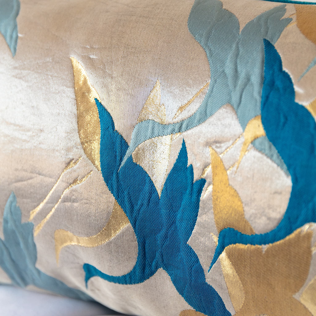 Teal crane silhouettes on shimmering pale gold silk ground, detail from vintage Japanese Fukuro Obi cushion