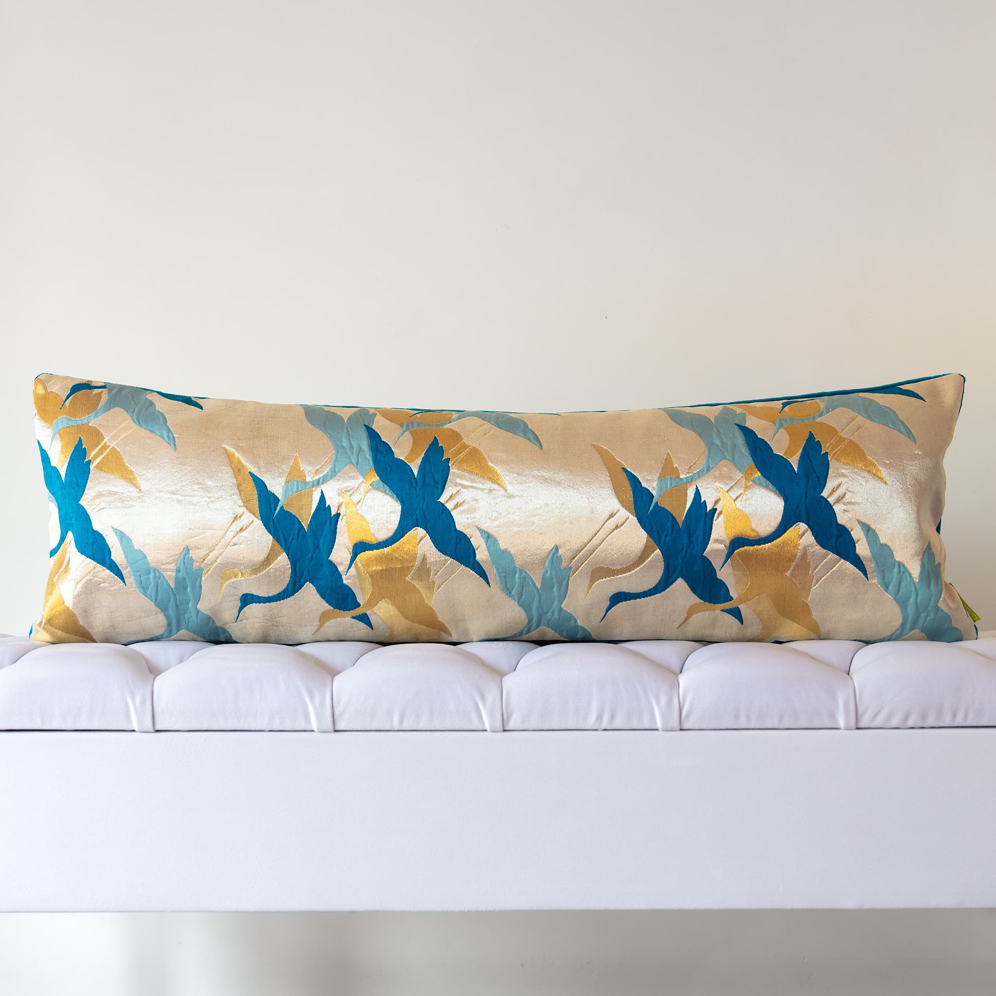 Long gold silk bolster cushion with stylised teal cranes on vintage Japanese Fukuro Obi silk, mid-century design