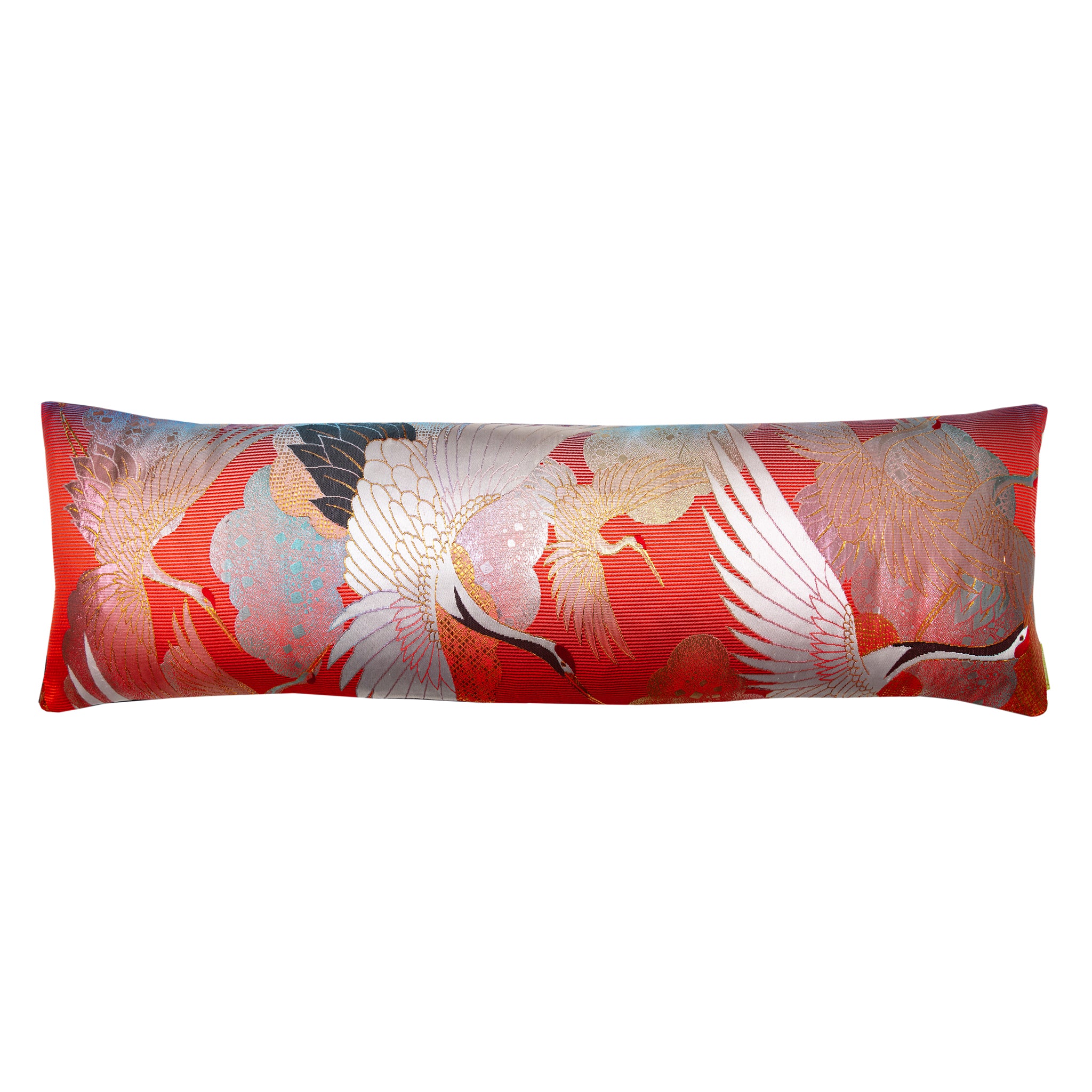 Long red silk bolster pillow featuring cranes in vintage kimono fabric, crafted from purple velvet by Hunted and Stuffed