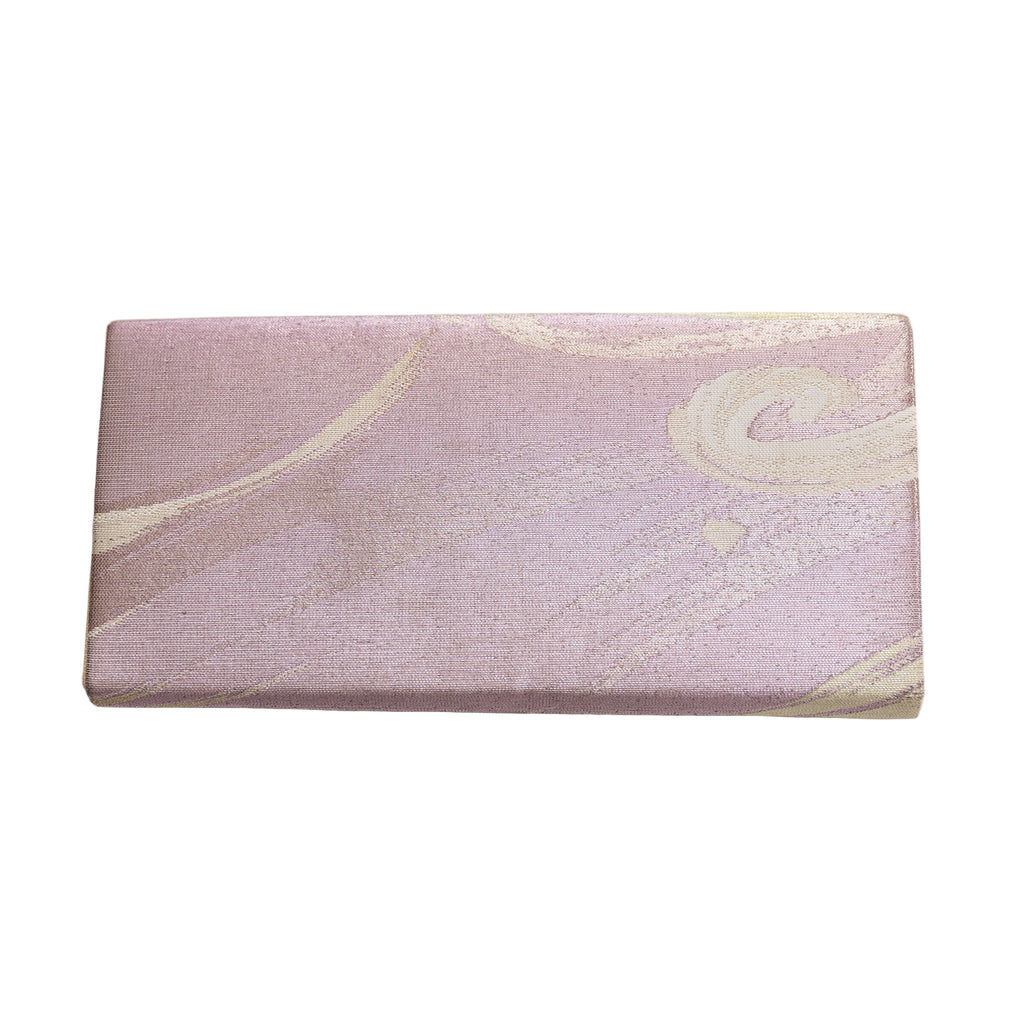 Reverse view of vintage Japanese silk clutch bag in lilac pink and cream.