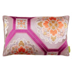 A decorative silk Japanese obi pillow with a geometric pattern and floral designs, featuring colors such as pink, mauve, purple, orange, silver, and gold.