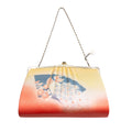 Vintage 1950's Japanese silk clutch bag in orange and yellow with peacock and fan motifs, silver chain strap, on white