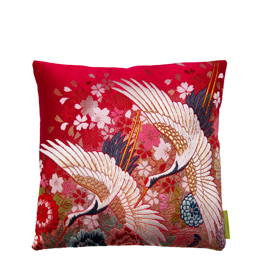 square cushion in vintage kimono silk, flying white cranes over red and gold flowers
