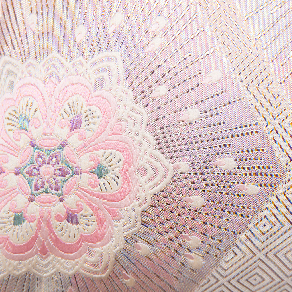 Close up of pattern with silver starburst fortune hexagons and pine bark diamond pattern.