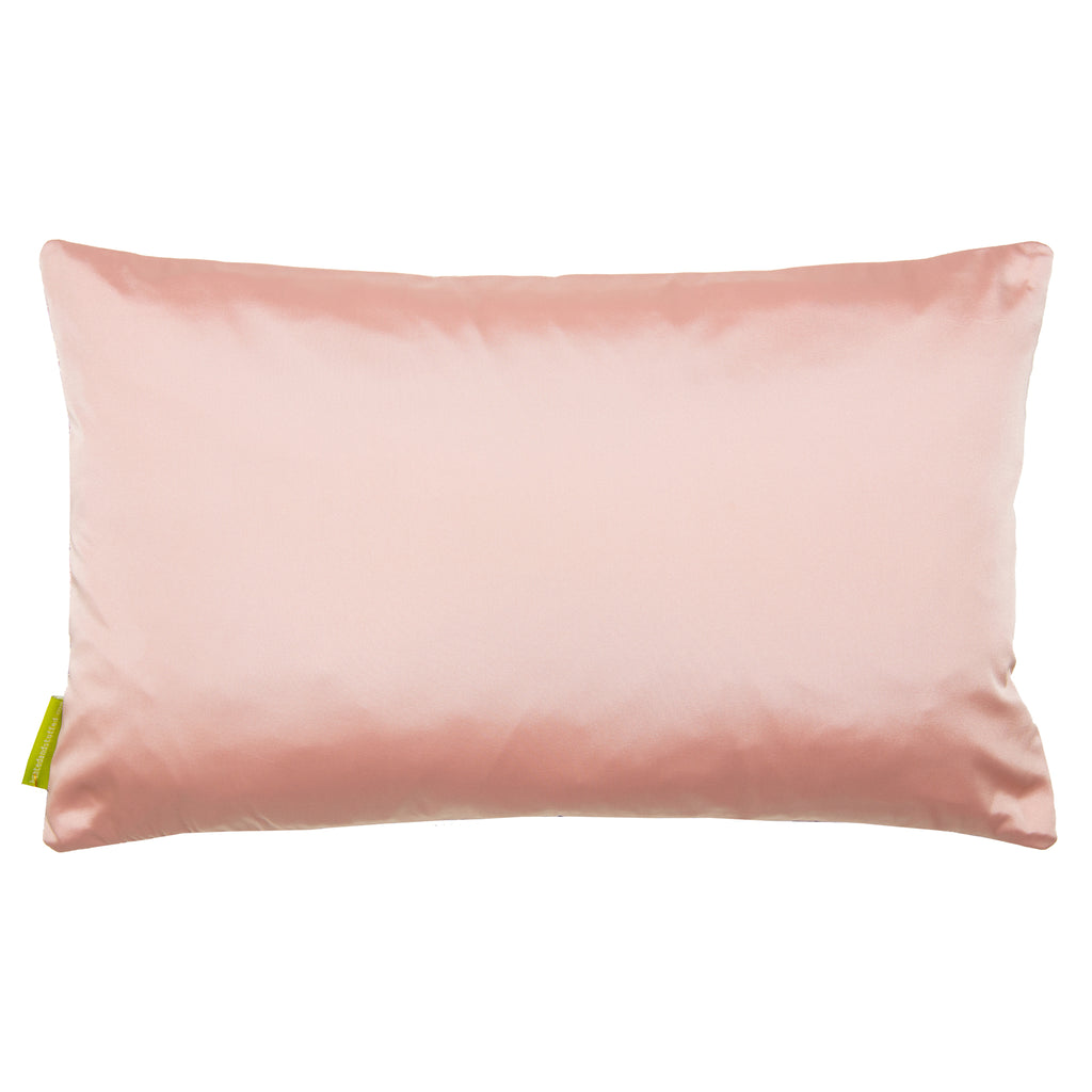Reverse view of the rectangular obi cushion in blush pink silk on white background.