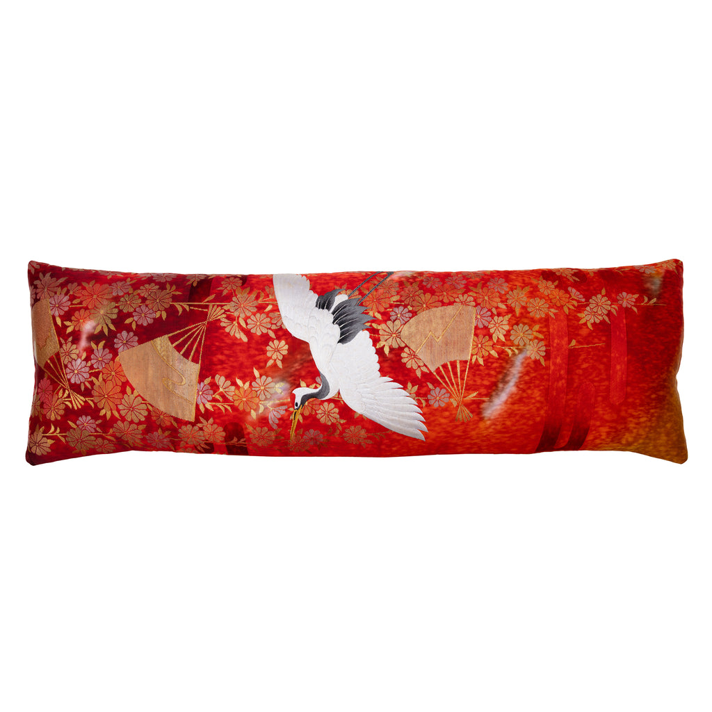 long bolster cushion in vintage kimono silk with white crane, gold fans and flowers over red