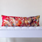 Red and purple silk kimono bolster cushion featuring cranes and layered florals, crafted from vintage Japanese silk
