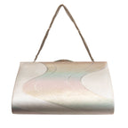 Vintage Japanese silk clutch bag in iridescent multicolour with winding river or stream motif, silver chain strap, on white background.
