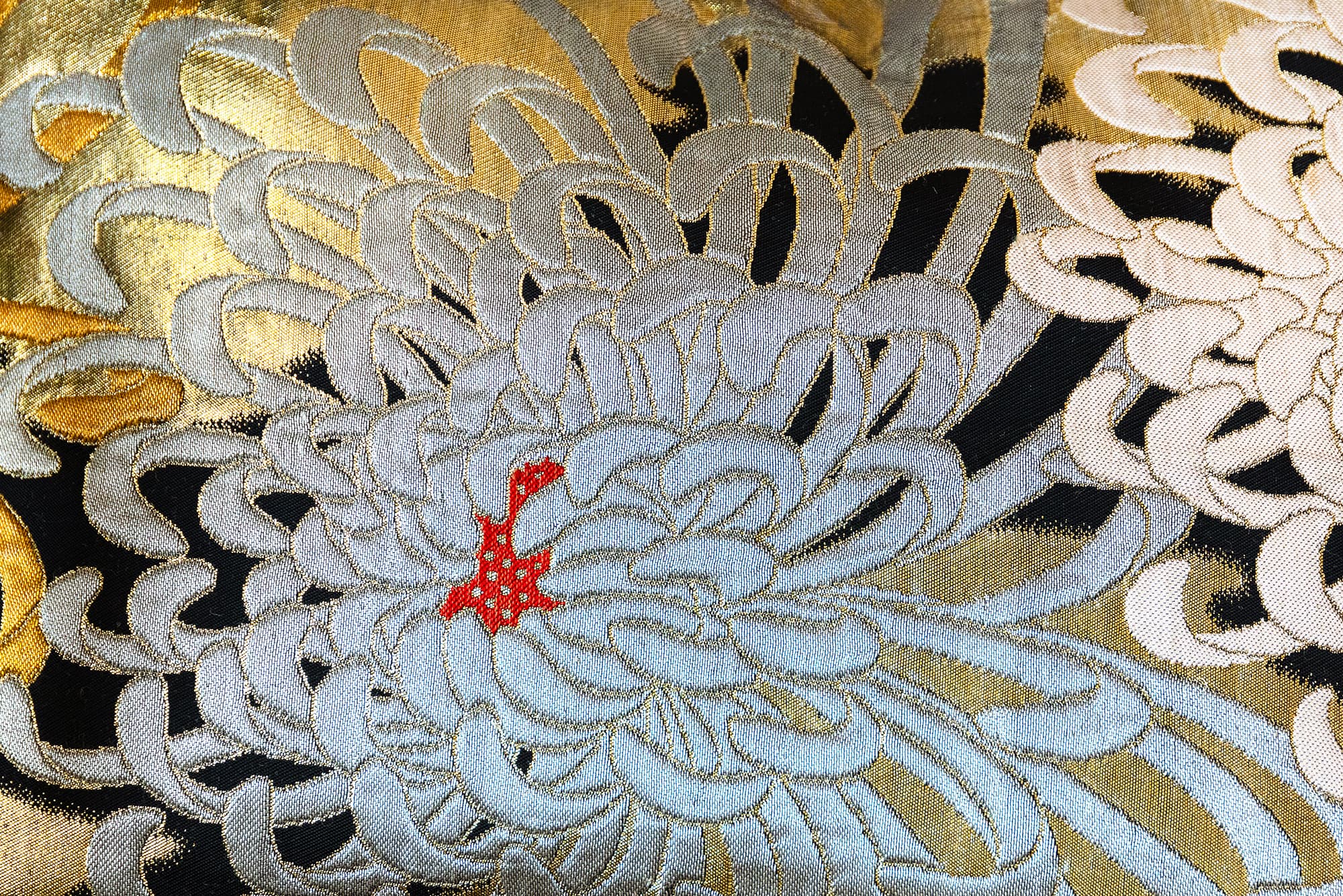 Chrysanthemum flower motif on a vintage Japanese silk obi, silver on black. (Kiku)
