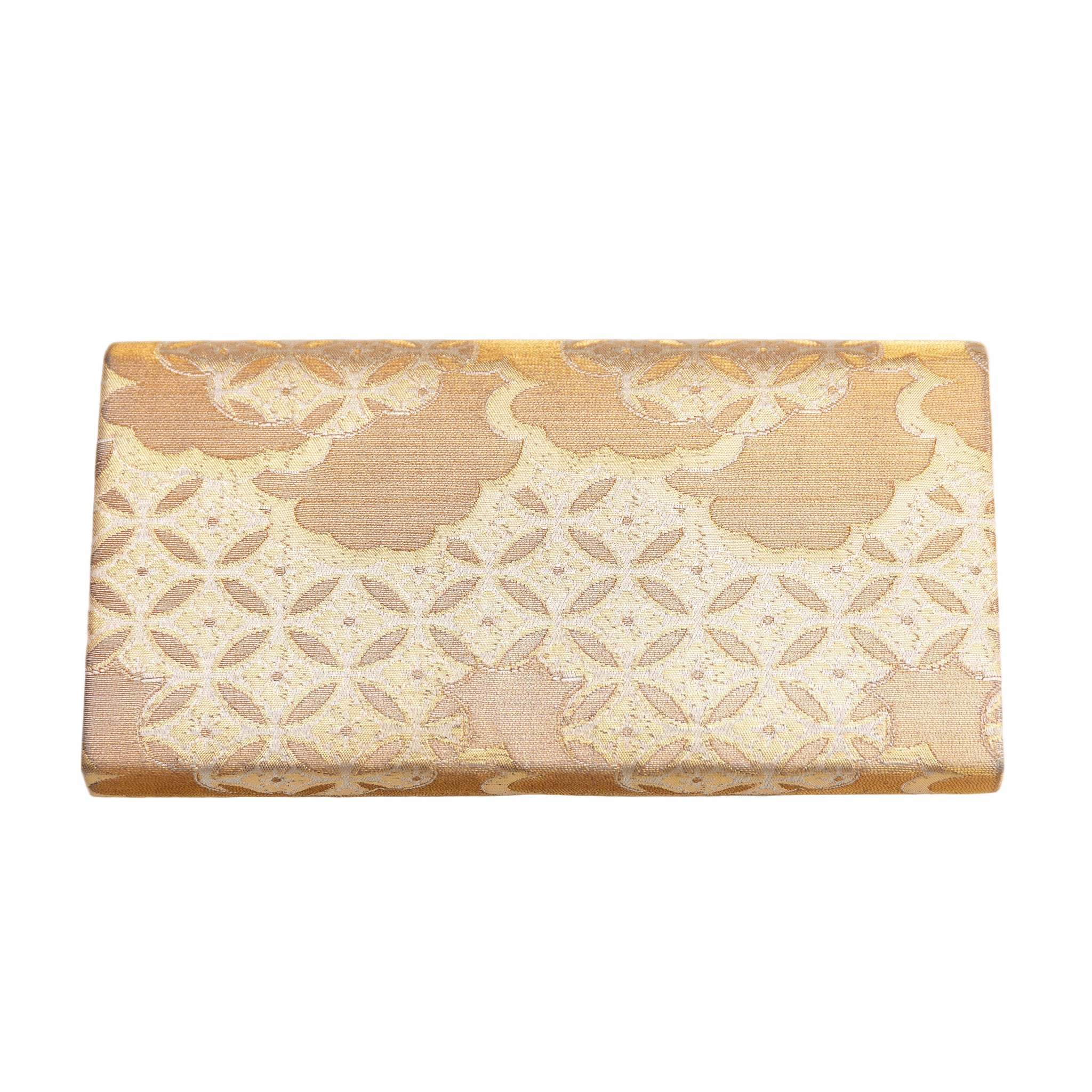 Reverse view of a gold silk vintage Japanese clutch  bag with geometric design on a white background.