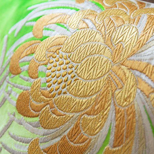 Metallic gold woven spider chrysanthemum motif on a vintage Japanese obi cushion.