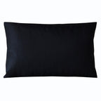 Reverse view of a black silk obi pillow on a white background