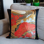 Close-up of peach velvet fabric highlighting its soft texture and subtle pines embroidery on the 16-inch Black Obi Pillow.