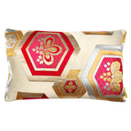 A cream silk obi pillow with metallic gold and silver hexagons and red Kiri floral embroidery by Kimono Living.