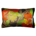 A black silk throw pillow with a floral pattern in red, yellow, and gold colors and a black border.