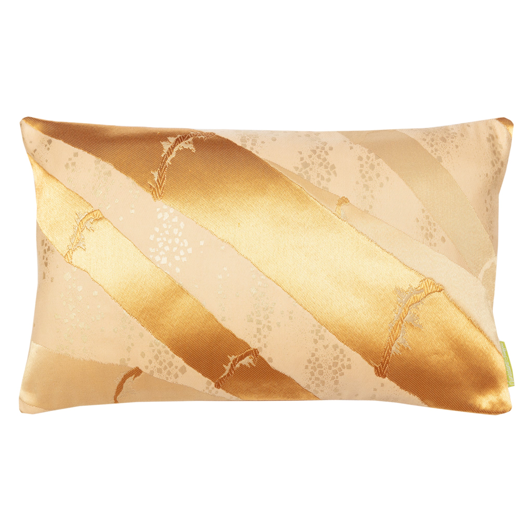 A rectangular cushion with a golden bamboo silk obi belt upcycled from a vintage Japanese garment, featuring metallic gold accents on butterscotch silk.