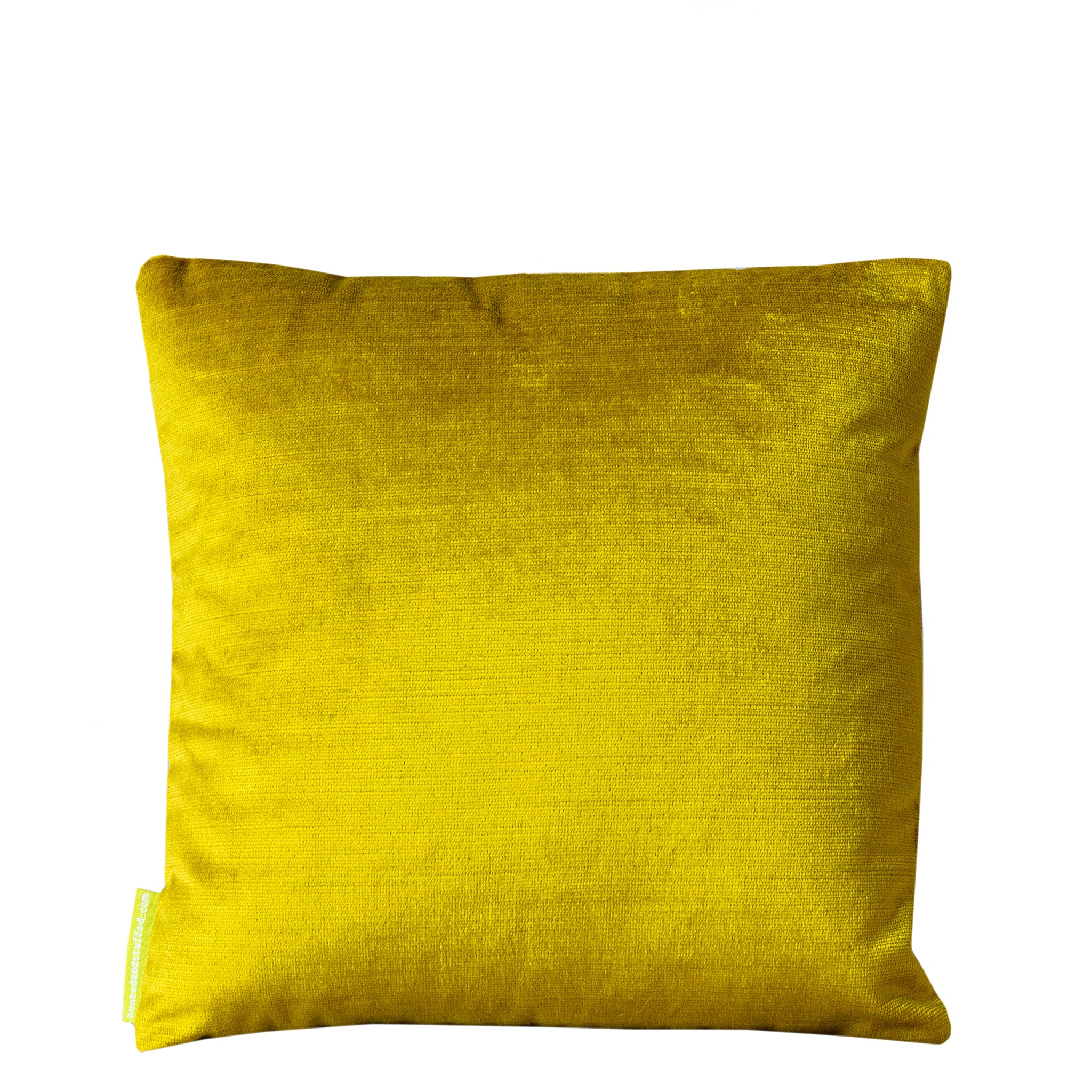 Close-up of the gold geometric embroidery detail on the chartreuse velvet Obi pillow’s textured surface
