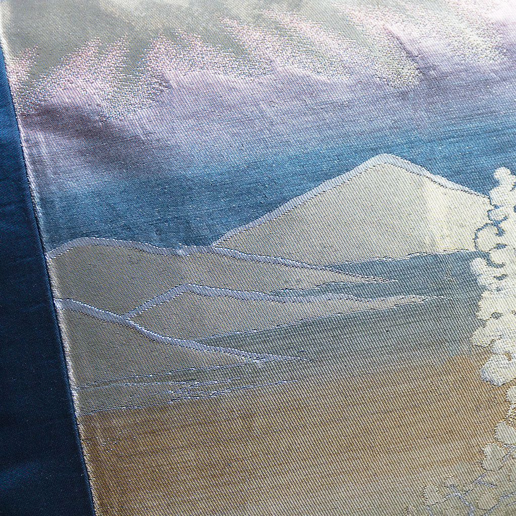 Close up detail of the silver mountains on the vintage blue silk obi cushion