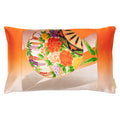 An orange ombre cushion with silver bamboo and floral designs, made from upcycled vintage Japanese obi silk.