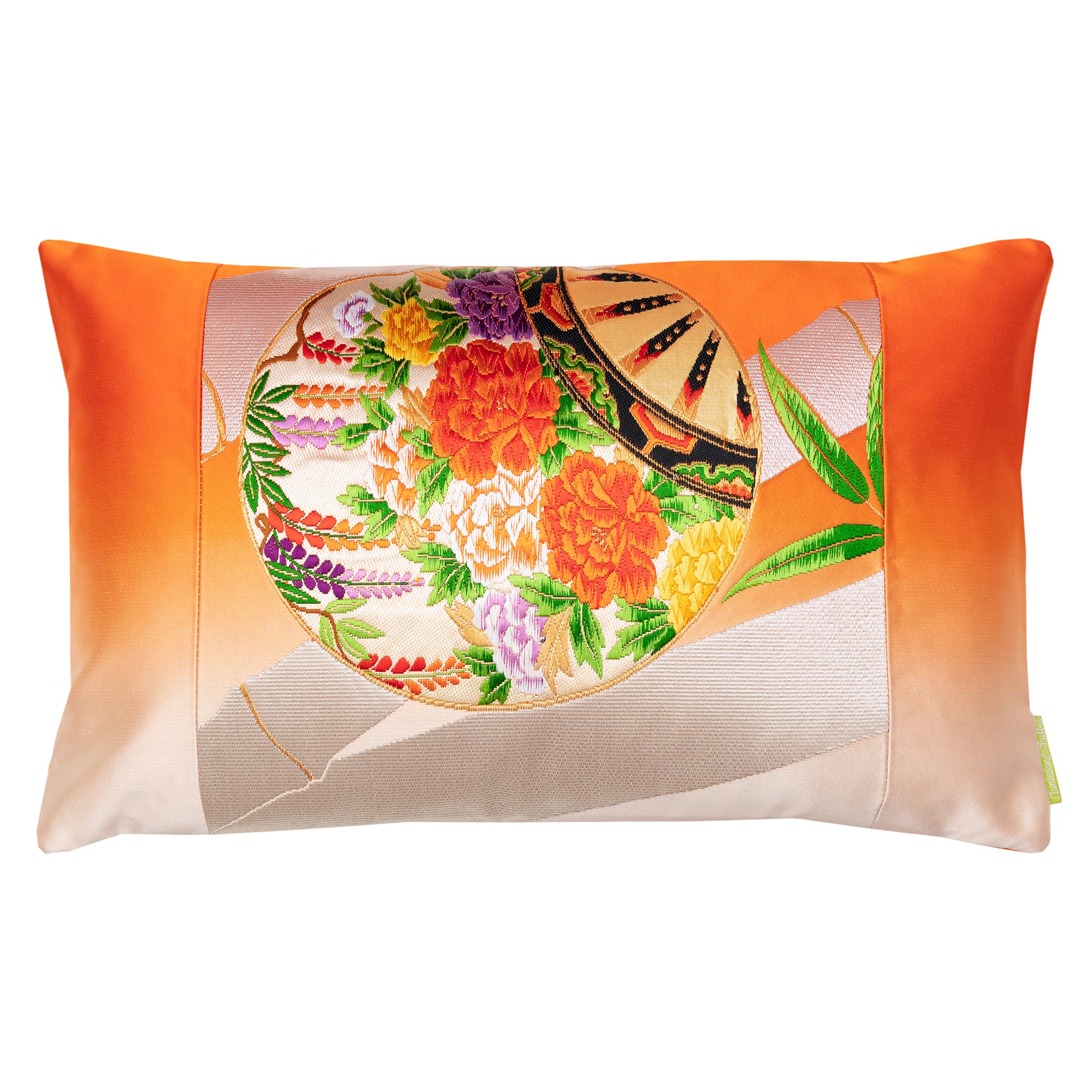 An orange ombre cushion with silver bamboo and floral designs, made from upcycled vintage Japanese obi silk.
