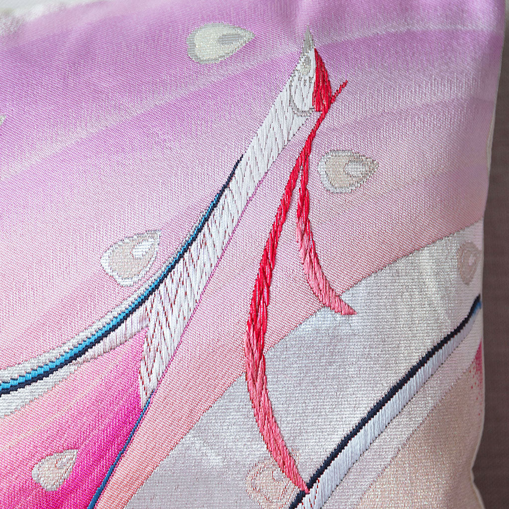 Stylised peacock design on a pink to lilac ombre silk cushion made from a vintage Japanese silk obi.