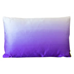 Purple ombre vintage silk pillow on a white background.