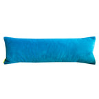 Close-up of vibrant kimono silk cranes embroidered onto the blue velvet bolster cushion fabric, highlighting intricate