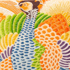 Close-up of the Pheasants Pillow's rich blue velvet corner detailing against the creamy silk fabric, highlighting luxurious