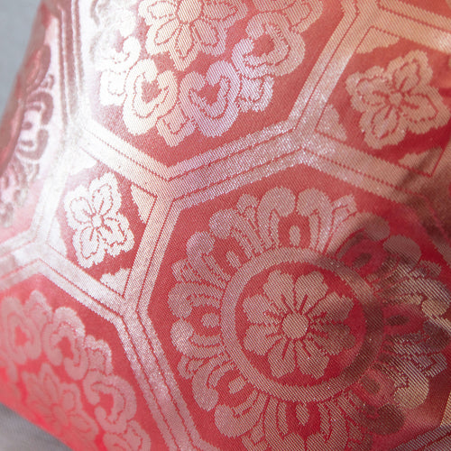 Close-up of the pink and silver obi silk with geometric pattern