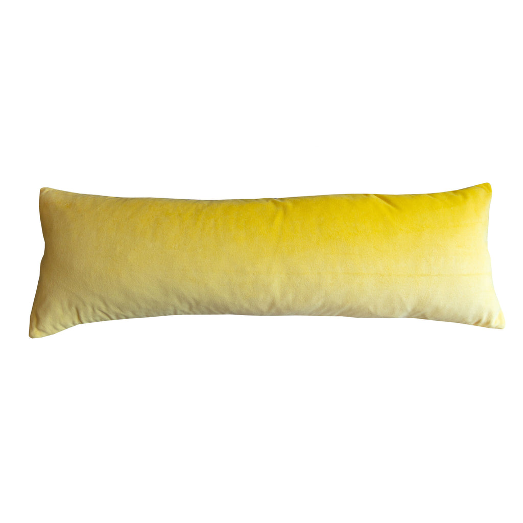 Reverse view of long silk bolster cushion in sunshine yellow velvet